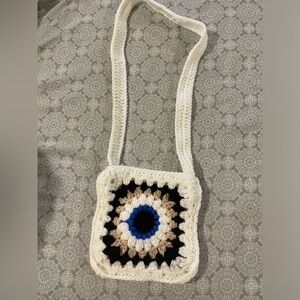 Homemade crochet granny square bag